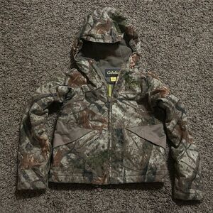 Cabelas Youth Small jacket. Thick and warm. My son never wore it.